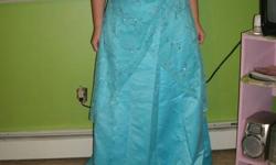Light blue with silver design through out top layer. size 12