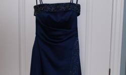 Picture 1:
- Private Collection, beautiful navy color dress, has been professionally dry cleaned.
- Removable shoulder straps, lots of beading.
- Size 0 - 5'2" and under $80
Picture 2 :
- Size 6 shoes $15
Picture 3:
- 3 piece jewelry set $60
Picture 4:
-