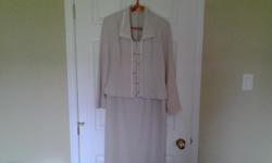 Formal beige two pieces suit, size eight.