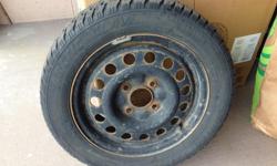 A set or four (4) Arctic Claw winter tires with rims (195/55/R15) in very good condition.