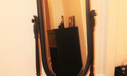 Free-standing floor mirror. The wood parts are oak, and a dark chalk-paint has been applied. The glass has an elegant floral-pattern etching. This item is in excellent sturdy condition.
Oval-glass dimensions (inches): 47" x 17"
Outside dimensions of