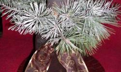 Beautiful center pieces made with fresh pine just in time for christmas! Prices ranging from $15 to $35. To order now, please call Laura at 537-4477 or 577-3877.