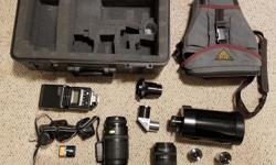 Canon EOS10S SLR camera with CR-1 remote control.
Canon 28mm-70mm and 70mm-210mm auto-focus zoom lenses.
430EZ flash.
Filters and hood for both lenses.
Bausch and Lomb D=80 f/10 FL=800 reflex lens with 18mm and 45mm eyepiece and camera adapter.
Hard and