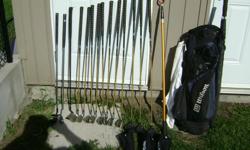 Set includes 3,4,5,6,7,8,9, PW plus 2 putters and 1 chipping iron
ball retriever, umbrella, D, 3 , 5 Metal woods with Weir covers, Wilson bag, w/ storm cover. Lots of balls and tees