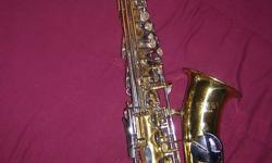 This is a Conn Saxophone that we have had for a number of years and really enjoyed playing with.
We arived in Nanaimo a year ago but since the house we moved into is so small we have to let our collection of musical instruments go.
I don't know much about
