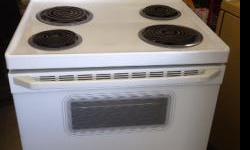 GE Electric Range, 30 in. bisque Easy Clean model, clean and reliable. $225. (204)661-4750.