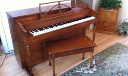 Famous Gerhard piano, designed to handle Canadian weather. Small upright ("apartment"). Light. Big sound. Proper action.