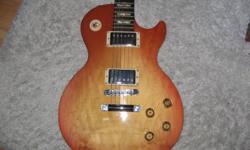 Great condition, 2006 Gibson Les Paul.  Original Gibson pickups, faded sunburst finish,  Gibson USA case           $1200.00
 
 
Red Paul Reed Smith, Limited edition for Sam ash music, #36 of 100.
McCarty prototype pickups, coil split in bridge pickup.