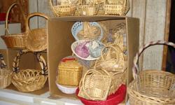 Over 50 new wicker gift baskets, all sizes, some coloured ones, $20, 705-645-1968