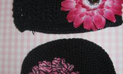 Selling small (0-9 months), medium (1-4 yrs) and large (4-adult) crochet hats.  12$ for just the hat and 3$ for the flower.  You can purchase as many flower clips as you like so the hat can match any outfit!  Hats are available in black, white and pink.