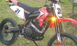 Giovanni x31 dirtbike it's a 2011 and its a 250cc 4 stroke. Selling it because I don't want a bike right now, the cover comes with bike (still wrapped in package) also comes with a little case of tools. There's a full tank of supreme gas left in the tank,
