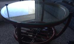 Glass coffee table with nice wooden frame, good condition