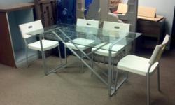 VERY NICE GLASS TABLE AND CHAIRS GREAT SHAPE GREAT DEAL $80 OBO CALL SHANNON AT 289-442-3713