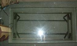 Glass top coffee table. 42" long x 21" wide
Matching end tables 21" wide x 22" long
$40