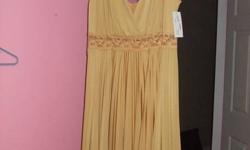 beautiful gold dress ...Marilyn Monroe style...very comfortable...perfect for xmas parties and new years eve... never worn tags still on it...size 3x... reg price $90.00...