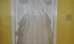 Beaded gorgeous wedding dress.
Was bought used for $450
In great shape. I believe it is about a size 9/10
Must be seen