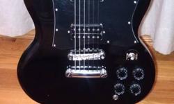 Epiphone SG
Model#: G-310/BK
Serial#: SI07122784
This guitar is modeled after the Gibson SG. It is an inexpsenive guitar, being only 200+tax when i purchased new. It is a great little electric guitar, with good action on the strings. This would be a