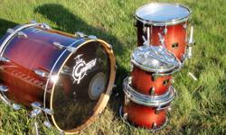 Gretsch Renown Maple Euro Drum Kit 4 Piece
                                 Cherry Burst
- 4 piece kit (drums only)
- 22" kickdrum, 14" floor tom, 12" rack tom, 10" rack tom
( tom mounting hardware included)
-3 years old..........$1349.99.00 new
-tubs are