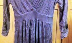 Grey dress/long top size XS
 
I am 5"1 and fits at a comfortable length.
 
95% Rayon& 5% spandex
Brand: Seductions
 
Worn only 1x.
 
Very cute for fall weather paired with leggings and boots!
Apologies for the wrinkles, I just moved and it was stored in a