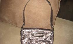 Guess Purse for $50.  Perfect Condition.  Contact Amber 519-631-3662.