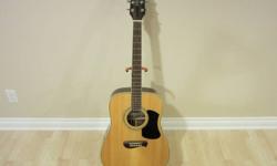 This guitar is made by Tacoma and is their Olympia model. It has a clean bright sound and is in great shape. This Guitar comes with a Guitar Stand, Hard Case, Electronic Tuner, Humidifier, Picks, Two Books 1 A complete guide to 1116 chords, and 2 A Modern