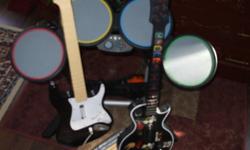 I have two guitar hero guitars, drum set and two sets of drum sticks all in working condition.  I need to sell as my girlfriend won't let me play anymore.  All equipment for $50.00.
Please call me at 519-504-8811