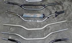 I have a few sets of handlebars, 3 tapered, 2 Renthal standard, $40/pr. Also 1 brand new stock steel bar off of my 2002 YZ250, taken off when the bike was new to swap for tapered bars, $25.