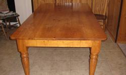 Harvest table with pine top.  6 ft long x 3'4" wide.  Has a single drawer.   Sits 6 people comfortably, 8 people is doable.   $500.00
