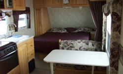 Forest River Palomino Gazelle 210 Travel Trailer
23', air conditioned travel trailer. Microwave, fridge with freezer, queen-sized bed, bathroom with sink, shower and toilet. Burgundy trim interior with oak cabinets. Clean and in excellent condition. No