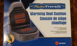 New, still in box.  AutoTrends Warming Seat Cushion for car.  12 Volt.