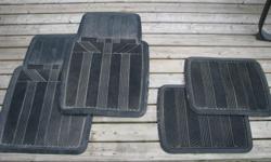 Set of rubber floor mats (2 front, 2 rear). Raised border for trapping water, snow, and dirt.
Used for a few seasons. Still in very good shape and very durable.