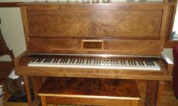Beautifully refinished Heintzman Upright Grand with bench (1930).  Been in our family since it was made.  Excellent condition!