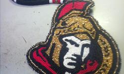 hey here are some of my work i do,i am an aboriginal artist and i do traditional beading but also do what you would like,sporst teams,cartoon people,basicly anything i will give it a try..lol,here are a few pieces,Red Blacks and Ottawa Sens.....great
