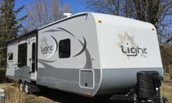 Check out this Highland Ridge, Open Range Light 282RKS travel trailer.
We bought it last summer, camped for a weekend in the fall and realized it's bigger than we need. We paid $44,300 + extended warranty $2980. + Protection package $2450. + $4700. HST.