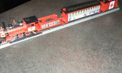 O Canada Train set from Bradford Exchange.
Engine, Coal Car and 8 cars right back to the Caboose!
Comes with Transformer, Track and Crossing Gaurds!
All new and never hooked up or used.
New, these pieces are over $1,300.00,
selling for $275.00 OBO