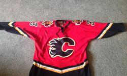 Canucks and Flames Jerseys..
Size XL
$50 each