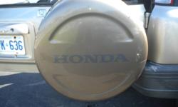 Selling a hard-shell cover for Honda CR-V Spare Tire, "Dark Gold" Colour
 
Was on a 2000 Model.  Measures 28" in diameter.  Has minor scuff marks.
 
Asking $200.00.  These covers are crazy-priced at the dealership &/or wrecking yards.
 
Please email if