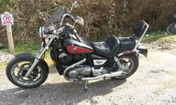 1985 Honda shadow 1100 cc. Black/red 65000 km . Runs great, excellent condition ,it also handles nicely ! collector plate, bike has always been inside!