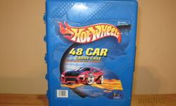 Hot Wheels 48 Car Carry Case With 48 Cars - carry case is in very good condition, holds 48 cars and is made in the U.S.A. Cars are all in very good condition.