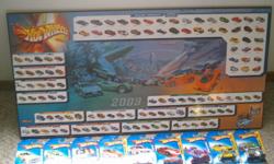 IAM SELLING MY HOTWHEEL COLLECTION I HAVE HAD FOR YEARS--THERE ARE 4 TREASURE HUNT CARS 2 BATMOBILES AND OTHERS COOL OLD CARS STILL IN THE PACKAGE--A PICTURE OF THE 35TH YEAR OF ALL THE CARS MADETHAT YEAR--AND A CASE OF 52 NEW OPENED CARS WITH A HOTWHEEL