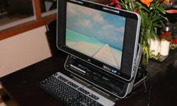 Up for sale is a HP TouchSmart IQ775 all in one computer. This PC can essentially do anything you want it to, and then some!
Features:
- Beautiful 19" Touch Screen monitor
- 1.9Ghz AMD Dual Core Processor
- 2GB of RAM
- 250GB Hard Drive
- Built in TV