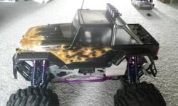 custom hpi savage .25 all redone one run since rebuild,new custom body,new dual exhaust,new tires and rims and so much more,not looking to trade just cash getting out of nitro,no lowball offers i will not respond,you will not be dissapointed with this