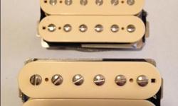 one pair of humbucker pickups for sale: $250.00
set is unpotted and has 2-conductor braided/shielded wire
Wolfetone Dr. Vintage, uncovered, double-cream, A2 magnets, 7.6K/7.8K Long leads on both pickups