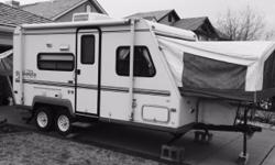 2002, 18 ft, Hybrid, Shamrock by Flagstaff, dual axle easy pull, trailer. King and double fold out beds, sleeps 6, 3 burner stove, air conditioning, stereo, washroom with shower, refrigerator with freezer section, two 20 lb propane tanks, very clean.