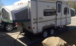 2002, Hybrid Travel Trailer. 18 ft, ultralite. 4800 lb GVW, 3000 lbs Dry Weight. Pulls easily behind a pickup or SUV.
3 Burner Stove, fridge, furnace, air conditioning, stereo, 2 x 20 lb propane tanks, awning, king size bed and double bed pull outs.
Very