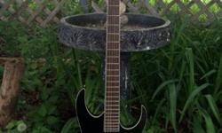 Hi there!
I'm selling one of my favourites from my collection, my Ibanez RGIB6 baritone guitar. Being an Ibanez RG, this guitar is impeccable for fast shredding and low-tuned riff-age. It's among the only baritones on the market that features a 28" scale,