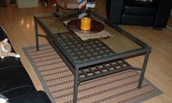 Metal Frame / Tempered Glass Top Coffee Table; 30 3/4" W x 46' L x 19" H; Dark Grey Sati Finish. $75.