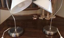 2 IKEA Kroby table lamps / desk lamps for sale in excellent shape-$12 each. LED bulbs included. Adjustable shade. Nickle arm and base, glass shade. Does not get hot to touch so safe for a child's room. Presently sells at IKEA for $19.99 + $5.99 for bulb.