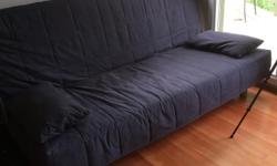 Selling an IKEA Sofa bed BEDDINGE in dark blue. Removable and washable cover, cotton