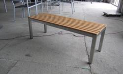 This modern style bench has a poly seat with stainless steel frame.Great outdoors and will be easy to maintain in all weather.
48" w x 16" D x 17" high.